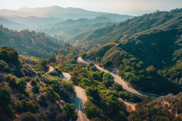 Serene winding road through lush green hills, capturing the beauty of nature and scenic landscapes.