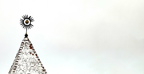 The snow-covered tower of the old castle in Lviv