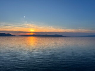 Sunset over the Adriatic Sea in the area at the foot of the Velebit mountain - Jablanac, Croatia (Zalazak sunca nad Jadranskim morem u podvelebitskom području - Jablanac, Hrvatska)