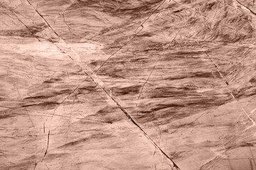 Natural quartzite texture with mocha tones and unique patterns, ideal for backgrounds.