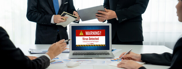 Virus warning alert on computer screen detected brisk cyber threat , hacker, computer virus and...