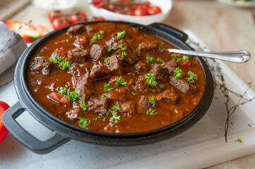 Paprika goulash with half pork and half beef meat in a delicious spicy sauce fresh and homemade...