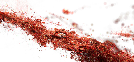 Abstract red glitter explosion on white. Perfect for holiday, celebration, or cosmetic designs.