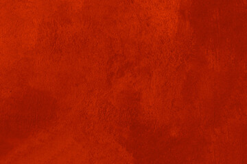 Texture of damaged, old red paint on the wall.