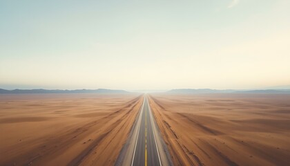 A desert road disappearing into the horizon