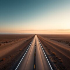 Fototapeta premium A desert road disappearing into the horizon