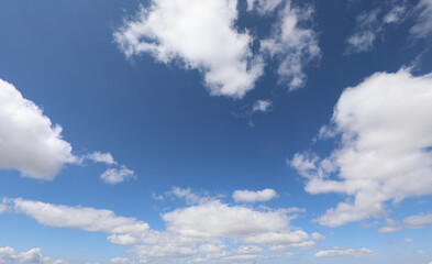 background with deep blue sky and white clouds without other elements perfect as a natural backdrop