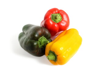 Bright sweet pepper lies on a white background.