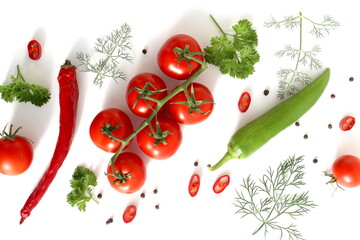 Fresh ripe harvest of vegetables lies on a white isolated background.