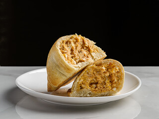 empanadas on a plate on a table in a restaurant