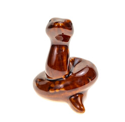 A porcelain figurine of a snake, chinese zodiac animal sign, white background