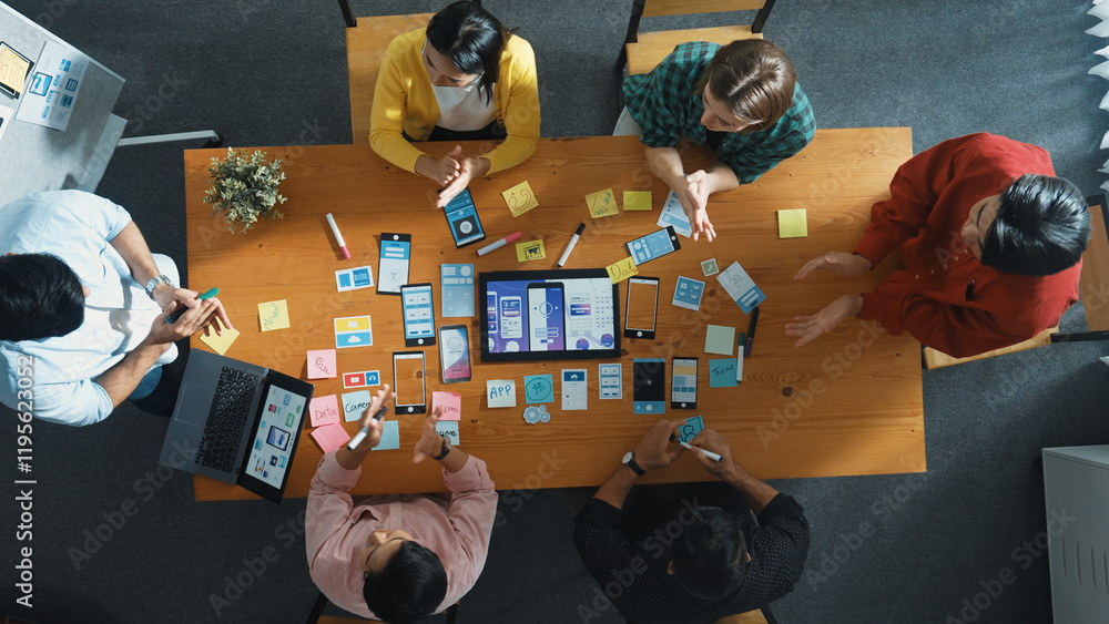 Poster top down view of business team writing idea on sticky note while planing for ux ui design for mobile