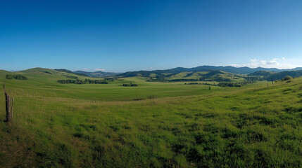 Fototapeta premium Panoramic Countryside with Rolling Green Hills and Bright Sunny Fields in a Tranquil Rural Landscape