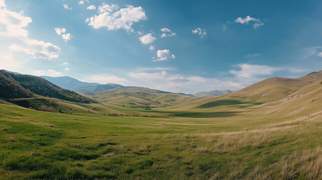 Panoramic Countryside with Rolling Green Hills and Bright Sunny Fields in a Tranquil Rural Landscape






