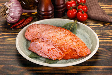 Raw marinated duck breast for cooking