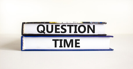 Question time symbol. Concept words Question time on beautiful books. Beautiful white background. Business and question time concept. Copy space.
