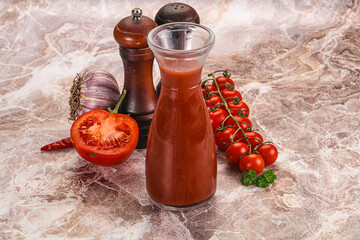 Fresh tomato juice in the glass