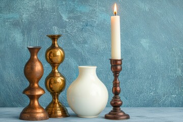 Elegant candle holders and vase display contemporary interior photography warm lighting artistic perspective
