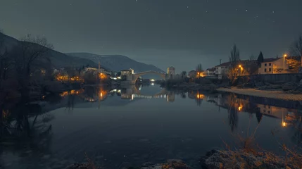 A long exposure of the Stari Most bridge in Mostar, Bosnia, reflecting perfectly in the Neretva River.