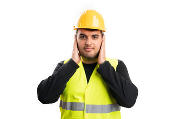 Adult builder man covering ears as not listening secret concept