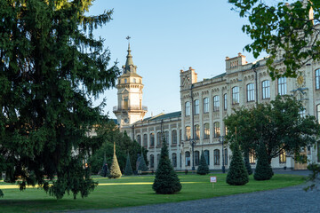 Facade of the main building of National Technical University of Ukraine "Igor Sikorsky Kyiv Polytechnic Institute" and the park in front of it.