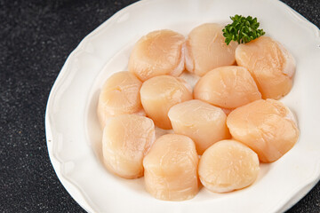 Raw sea scallop seafood fresh tasty food dish gourmet food background on the table rustic food top view copy space keto and paleo diet vegetarian  food pescetarian diet