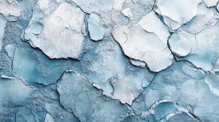 Obraz premium Cracked blue textured surface with layered patterns and natural details