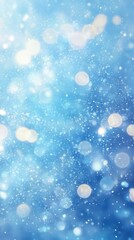 Obraz premium Shimmering blue bokeh background with glowing light and sparkling particles