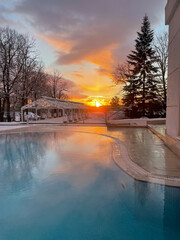 A beautiful view of the water park with colorful slides and a pool on a sunny day. The banner is ready.