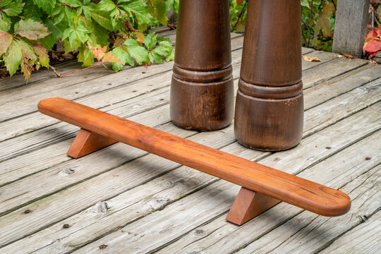 shena push up board and Persian meels on a backyard wooden deck - Powered by Adobe