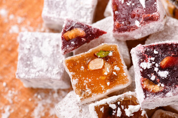 Sweet food Turkish delight, assorted rahat locum in form of cubes with nuts and powdered sugar, traditional food