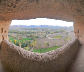A rock with niches in which Buddha statues once stood in Bamian, Afghanistan