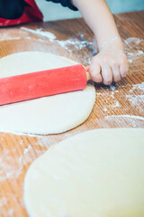 Children participate cooking master class. Culinary courses for children. Cooking pizza.	