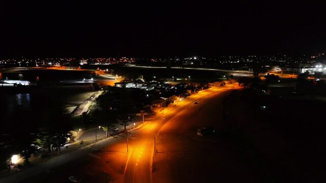 Aerial view of the Wallaroo street illuminated at night in Coomba Park, New South Wales, Australia