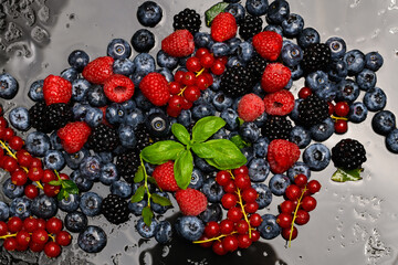 Background of fresh berries. Berry fruit. Blueberries, blackberries and raspberries. Vitamins in natural products. Berries.