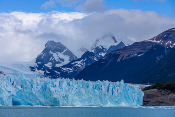 Perito Moreno glacier in Patagonia, Argentina. Blue ice glacier with huge seracs falling into the...