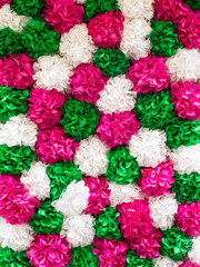 Close-up of the hand made paper flowers that are used for decorations during the Festa dos...