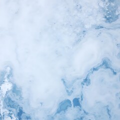 A swirling expanse of deep blues and lighter veins creates a marbled texture