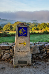 Spain, Galicia. 100 km marker which is the minimum distance one must walk In order to receive a Compostela (Certificate) upon arrival in Santiago