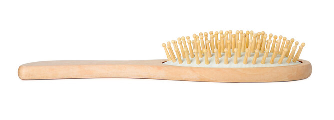 New wooden hair brush isolated on white