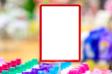 Advertisement mockup. Blank empty red signboard or billboard against blurred supermarket background