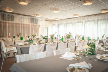 Tables and chairs ready for a wedding reception and dinner.