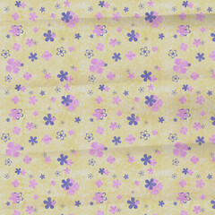 Pastel yellow seamless floral pattern with purple and pink tiny blossoms and textured grunge effect. Cute cheerful design perfect for textiles and wrapping.