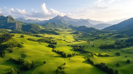 Obraz premium Beautiful sunrise over lush green mountains, casting a warm glow across the rolling hills and valleys in a serene morning scene.