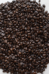 Top View of Roasted Coffee Beans, Textured background – Minimalist Design for Coffee, Food, or Beverage-Related Content and Creative Projects