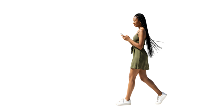 Businesswoman using phone during coffee break with paper cup in hand