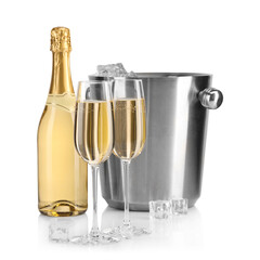 Champagne and bucket with ice isolated on white