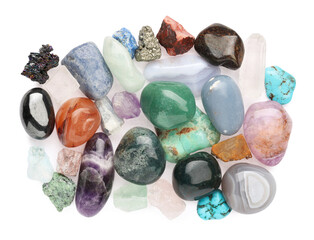 Pile of different natural mineral stones isolated on white, top view