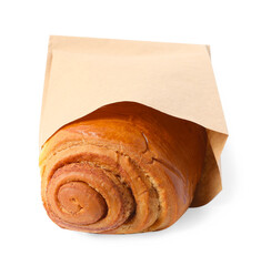 Paper bag with freshly baked bun isolated on white