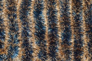 Beautiful shiny tinsel as background, closeup view